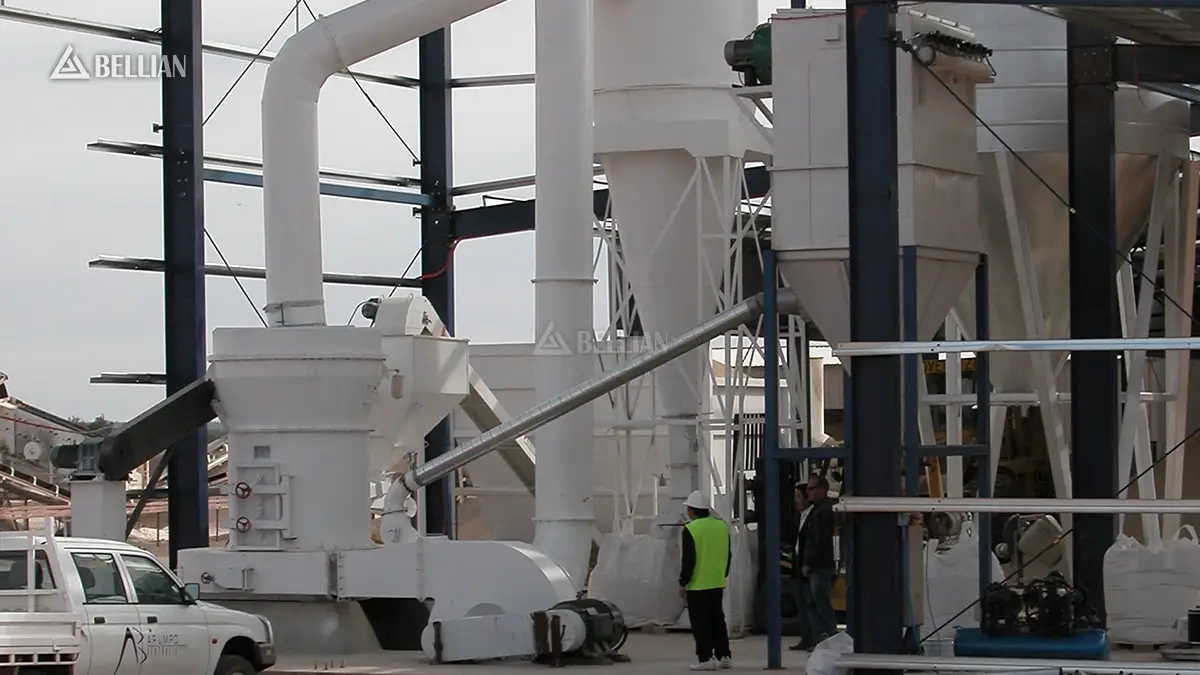 Site engineers and Australian client inspect installed 5R4121 raymond mill main machine at outback mining site