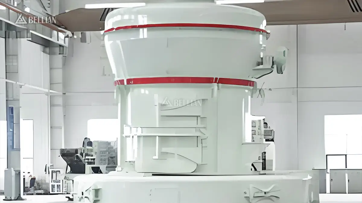 Front close-up of MTW138 European trapezium mill main body with thickened curved shell and red sealing pressure ring inside finished assembly workshop
